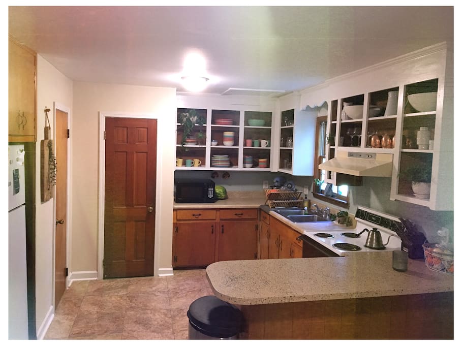 Kitchen! You're welcome to use any of our cutlery & cookware, just clean up after yourself. Note: no dishwasher or disposal.