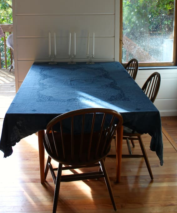 Russel Wright midcentury modern table with hand-dyed indigo tablecloth.