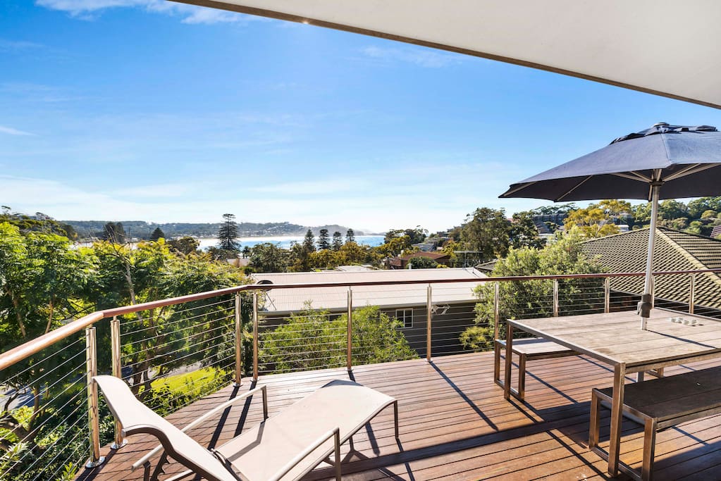 Enjoy views of the ocean on the back balcony and entertaining area