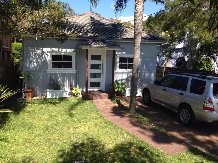Our house. Modernised original Narrabeen beach style cottage. Driveway parking for 3 cars tandem, plus lots of extra parking across the road. On the flat in North Narrabeen, so easy to walk or ride anywhere!
