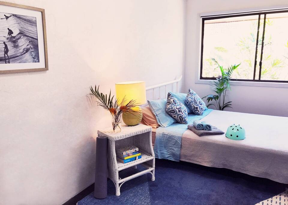 Spacious sun-lit bedroom Nr. 1 with comfy queen bed