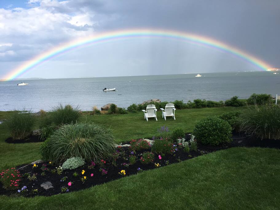 Backyard with the occasional rainbow! Not photoshopped, I swear — I just got super lucky with this picture!