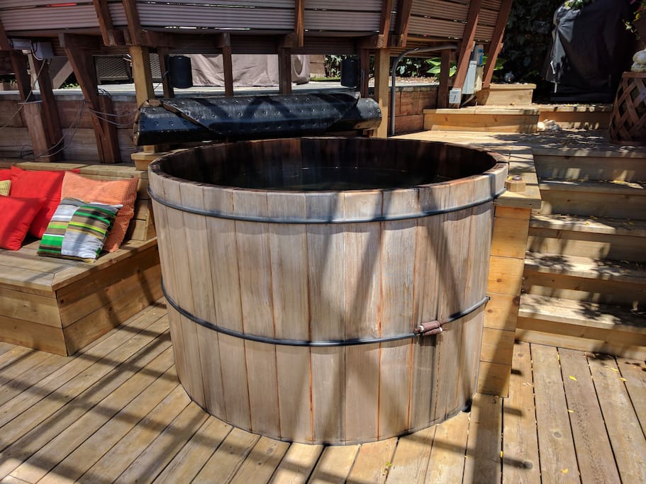 wooden hot tub sits 8 adults comfortably