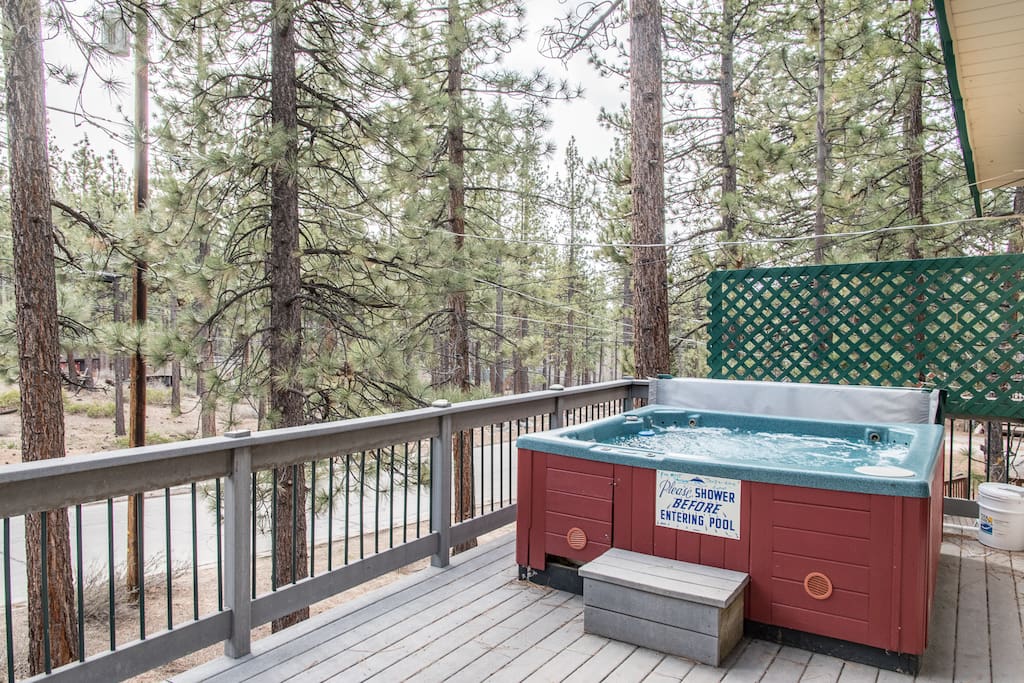 Sink into a bubbling hot tub on your private deck.