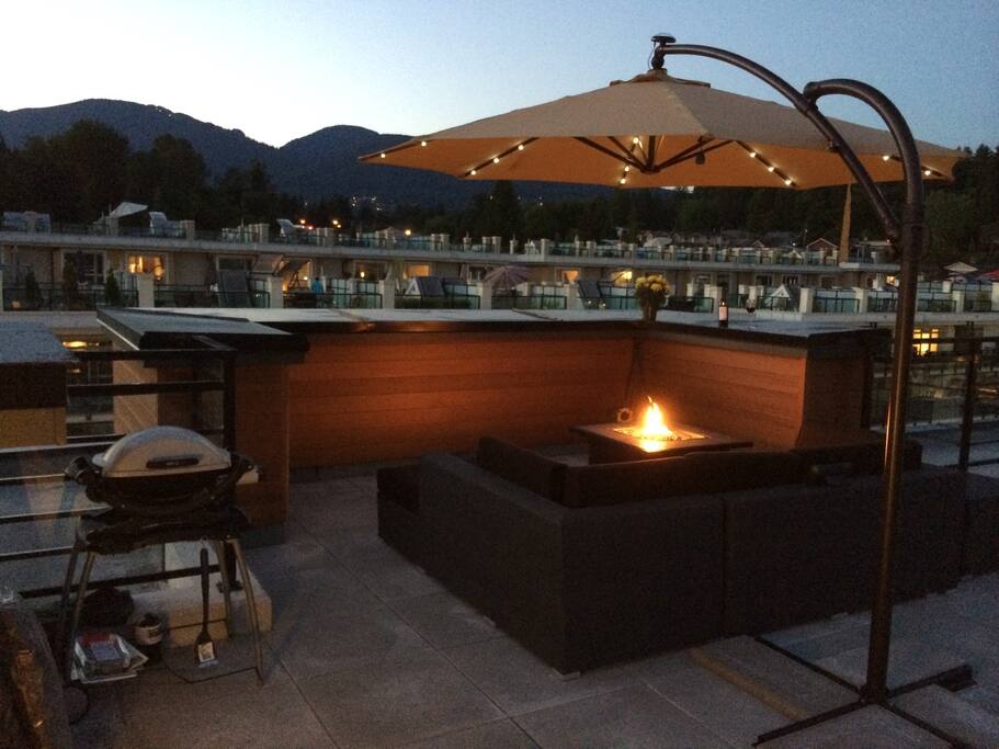Perfect private rooftop deck to wind down and enjoy a glass of wine by the fire!
