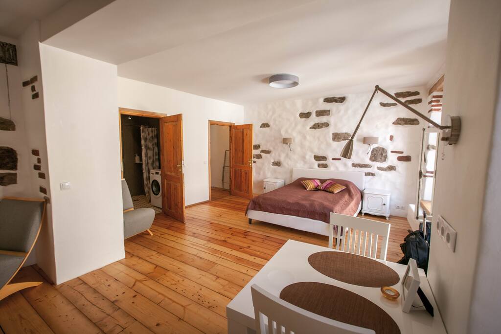 There is washing machine in bathroom and big walk in cupboard where you can hold your clothes and other belongings.
