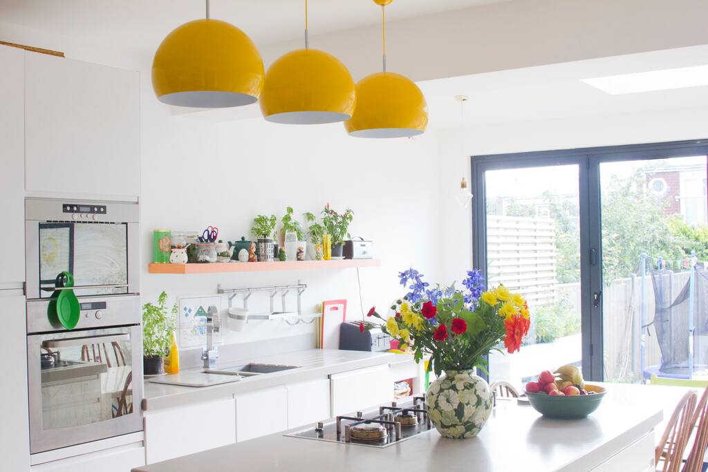 Large open plan kitchen with bi-fold doors onto the garden.