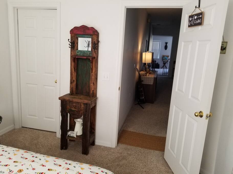 Rustic stand with mirror.