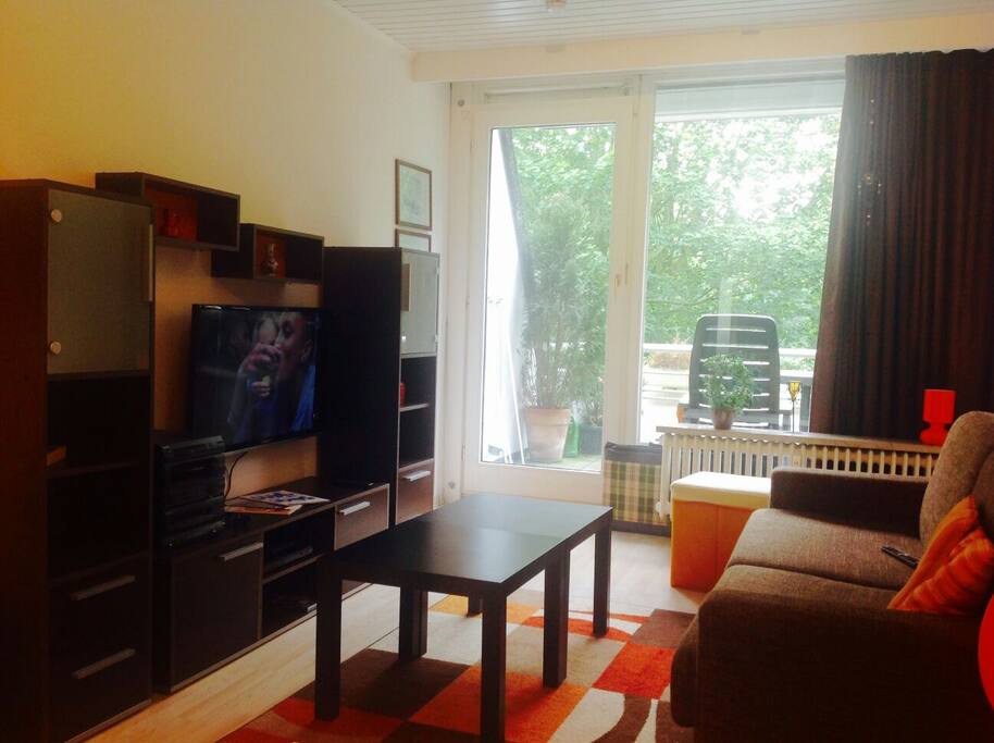 Sofa TV ... with a view of Balcony