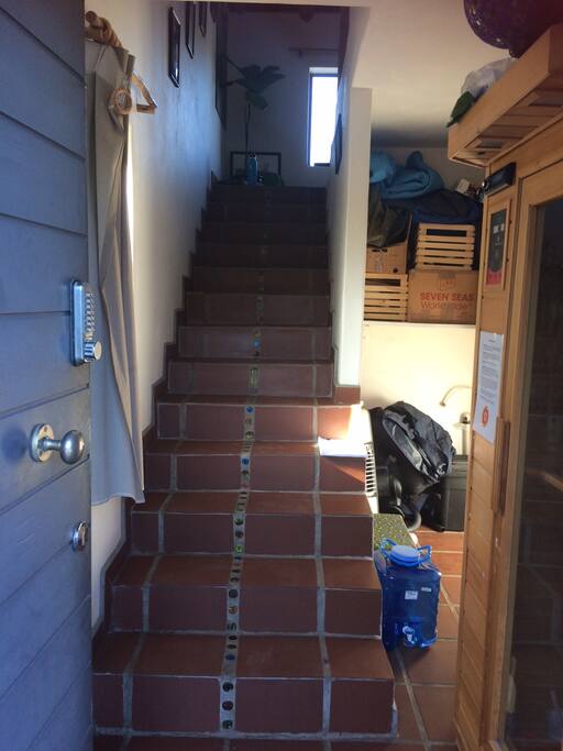Stairs up to the loft off the ground