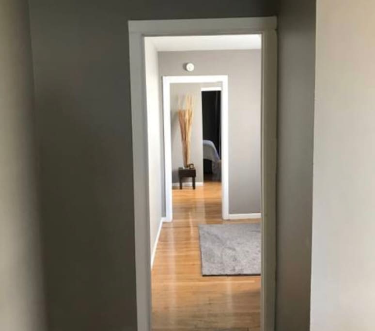 “Railroad” style apartment. Grand hallway.
