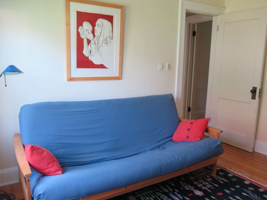 Second bedroom with a futon couch