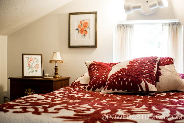 The loft has a low, peaked ceiling making it perfect for snuggling in with a book or your sweetheart.