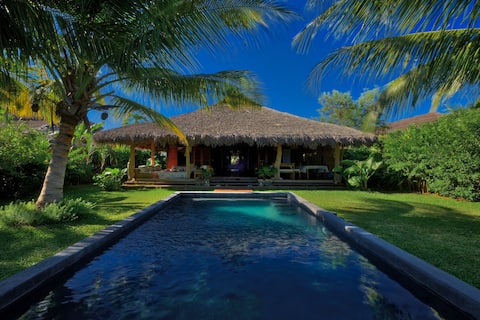 Villa feet in the water with full staff and pool
