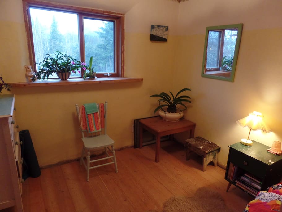 This room is just big enough to do your morning exercise. Yoga mat included.