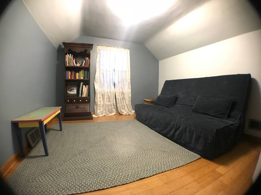 Upstairs lounge area has a futon that turns into a double bed.
