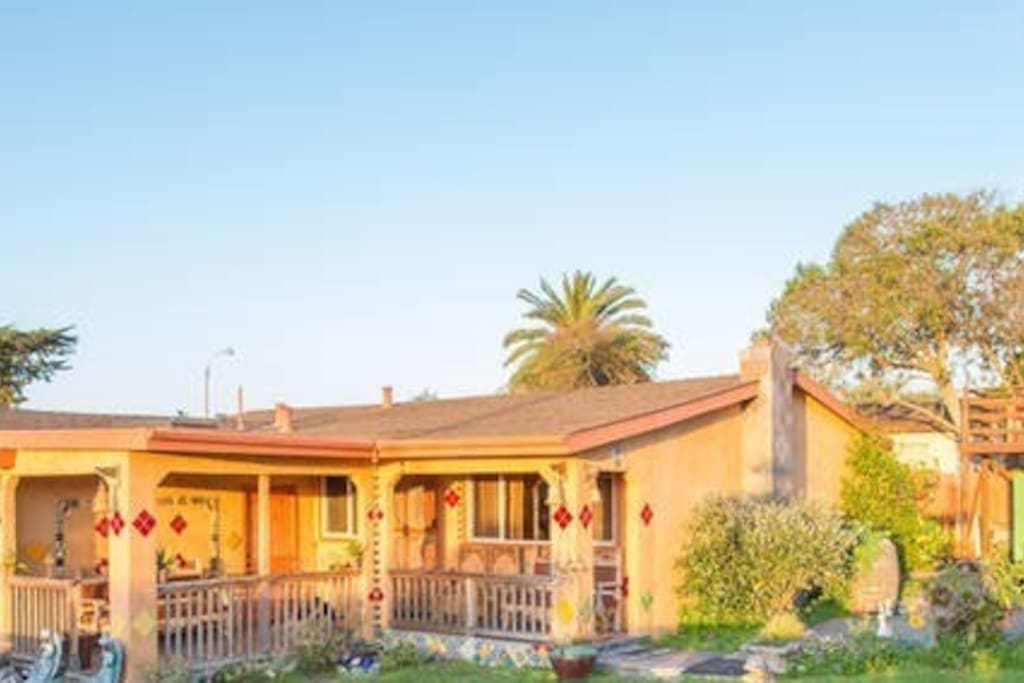 The Seaside Bungalow, Rustic Old Monterey Charm in a Cheery, Working Class, Neighborhood. The lush green lawn is gone. We are creating an earthbag organic garden in the front yard.
