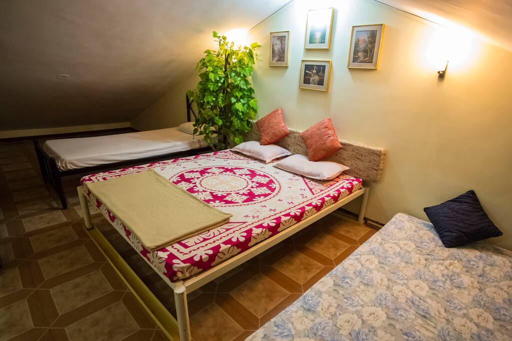 The 1 BHK Bedroom European style in the attic with a Ac for instant cooling .