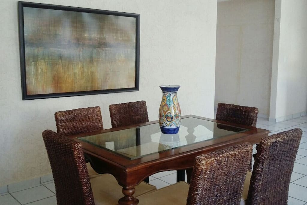 Dining room table with background art