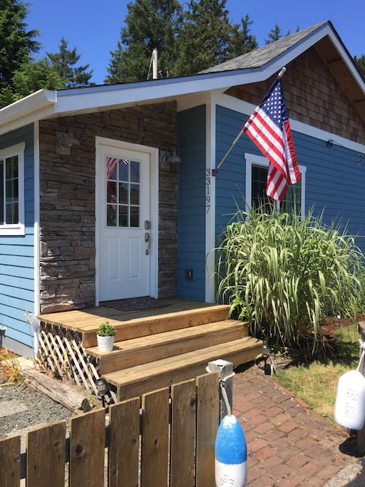 Front Door with cedar steps.