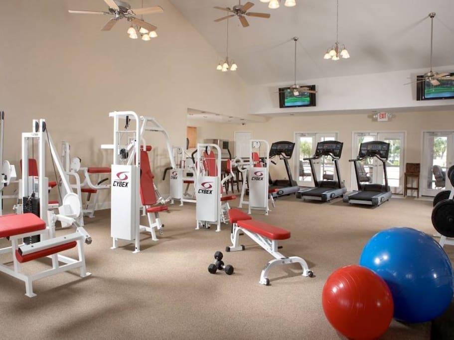 Gym with Kitchen, Saunas, bathrooms, and outside pool area (2nd pool in complex)