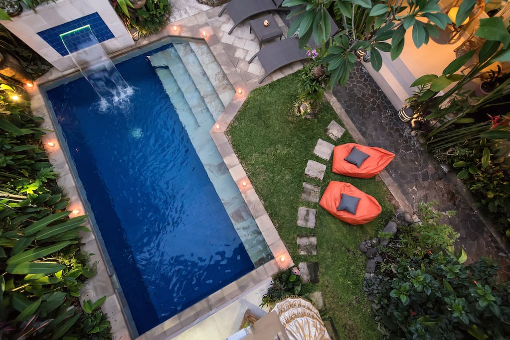 View from your private balcony to pool, temples and tropical garden.