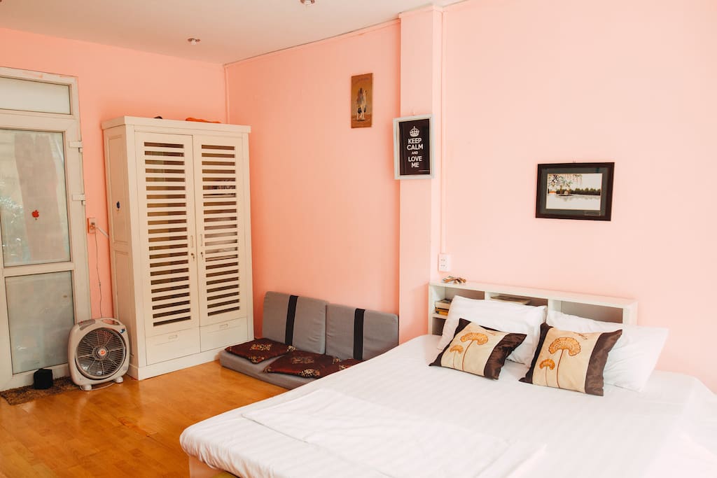 Pink room with the white furniture