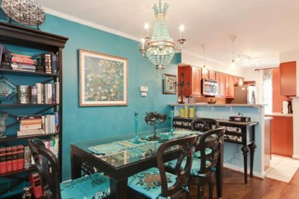 Formal dining area comfortably seats 6 guests.