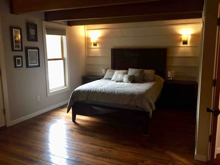 Cozy master bedroom with queen-sized bed, closet space and drawer space. Includes private entrance to screened-in porch and bathroom.