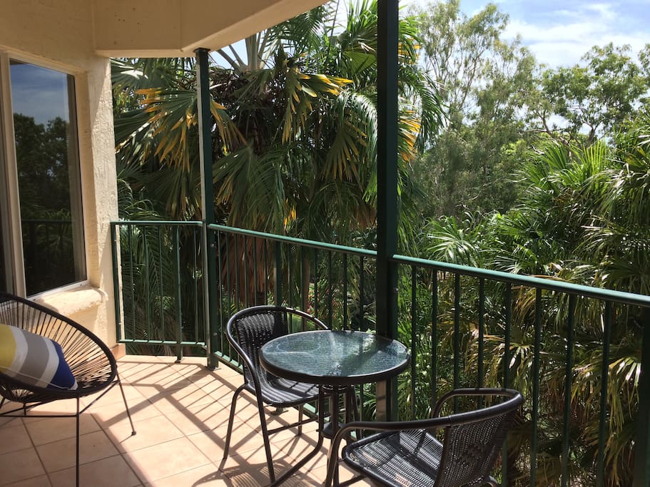 Enjoy a cold beverage on the balcony overlooking the botanical gardens