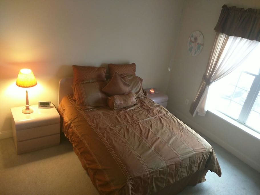 High ceiling top floor master bedroom with ceiling fan