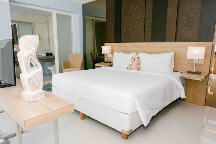 This is the main bedroom on ground floor. Equipped with King Koil double bed king size, white bedsheets, 4 pillows, and duvet for your convenient sleep throughout the night  
