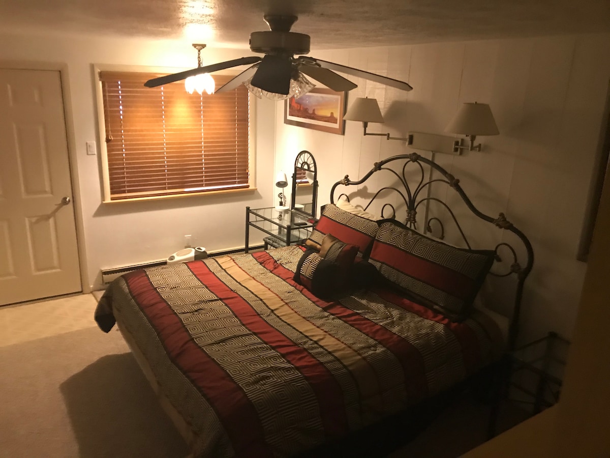 King Bedroom and back door to ski lockers