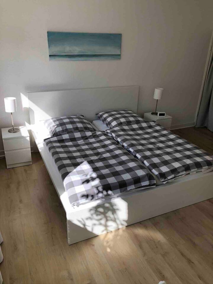 Cama doble con 2 colchones de látex con diferentes grados de dureza