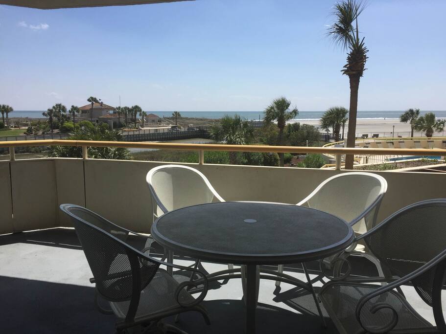 Balcony table seats 4 for meals or just sitting out.