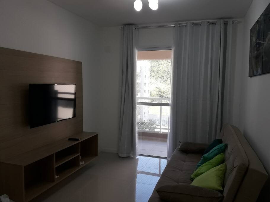 Sala de estar com sofá-cama