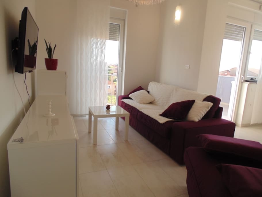 Living room with tv and sofa