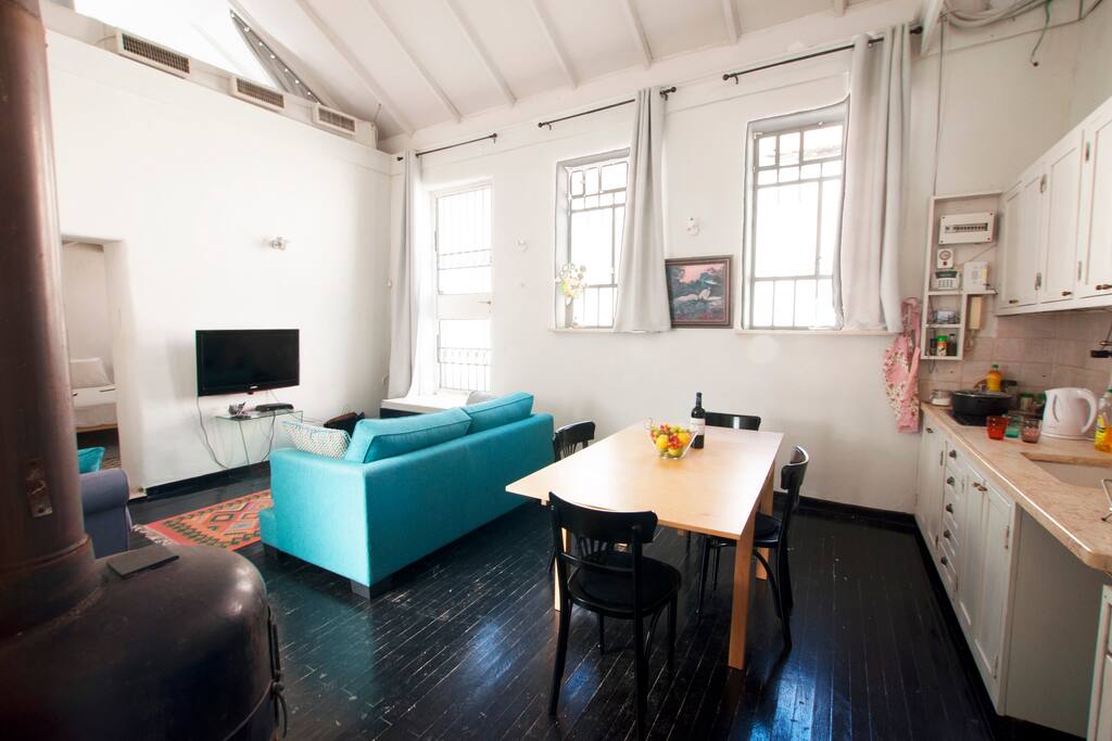 Very nice living room with this sofa bed (30m² and 5m ceiling height)