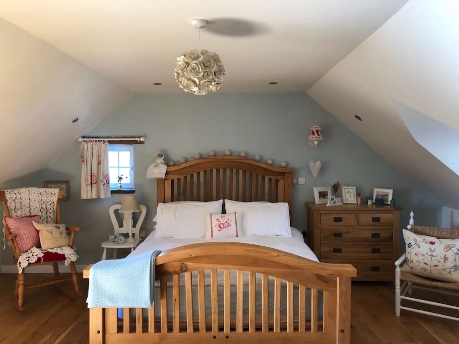 The Master Country Room - King size bed with large living space. Internet TV within the room and bathroom next door