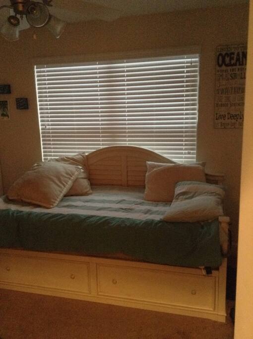 Beautiful guest bedroom on third floor sleeps 1 to 2 on daybed