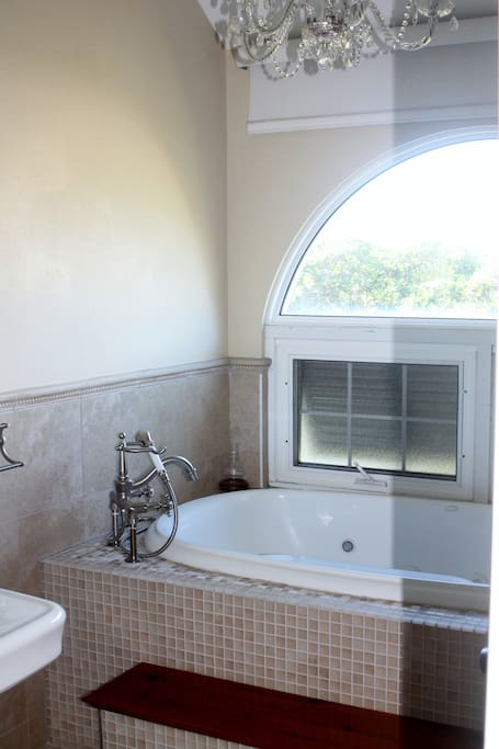 Gather your thoughts in a whirlpool soaking tub with a large separate shower and overland views.