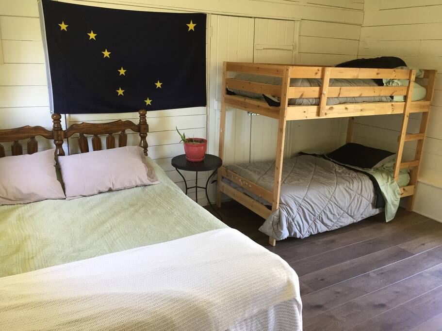 Twin mattress under queen for extra guest.