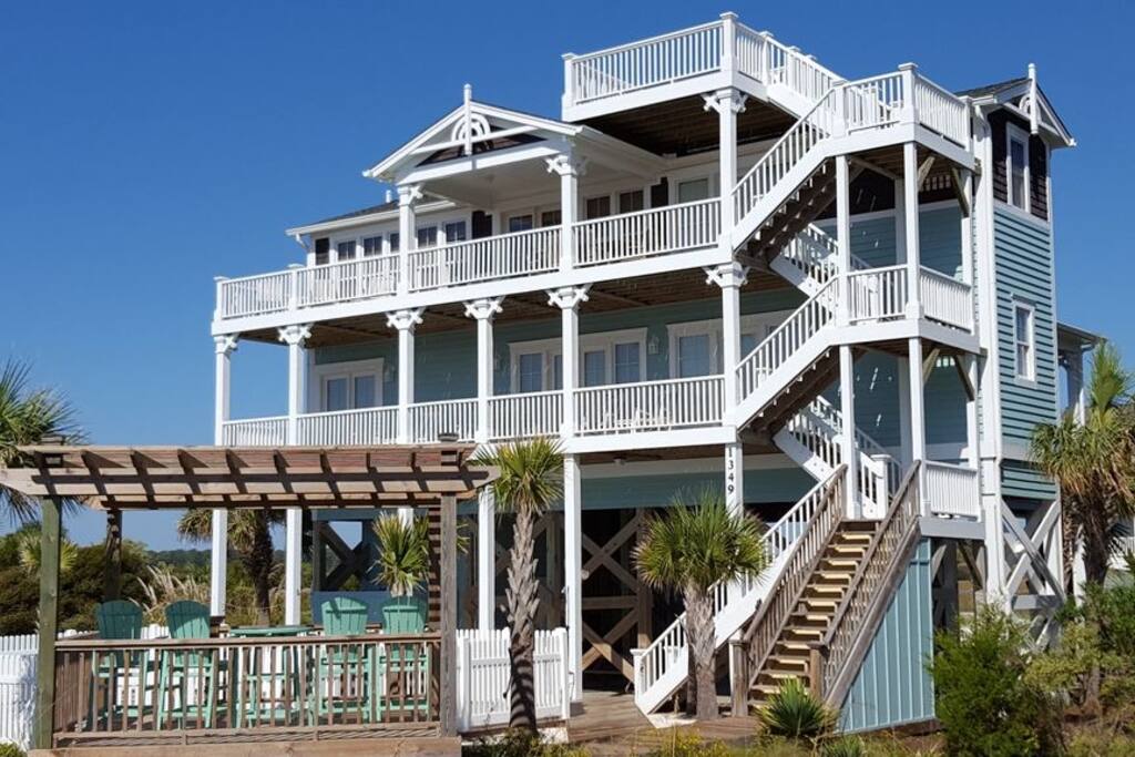 Ocean front view with pool, gazebo and under home parking
