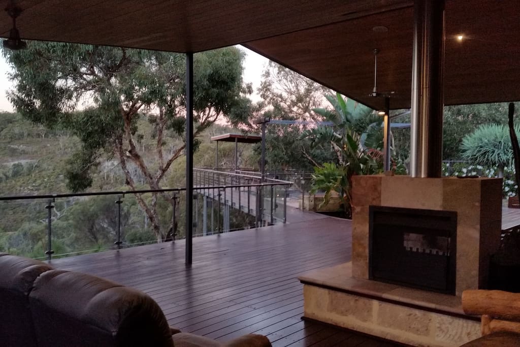 Double-sided fireplace in the outdoor kitchen