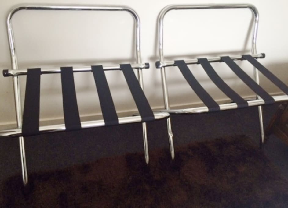 Two suitcase racks available so no bending down!