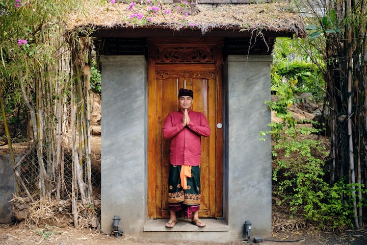 Airbnb Host waits at door