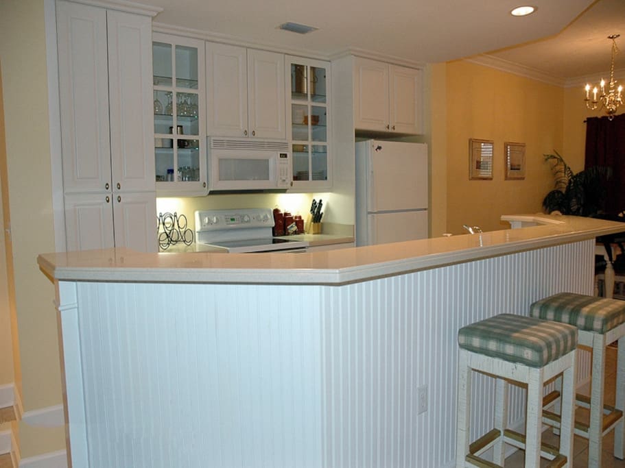 The kitchen is well equipped and has bar seating.