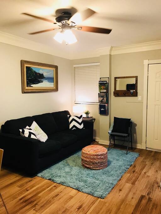 Open concept living area, table for 4 not pictured but in the same room