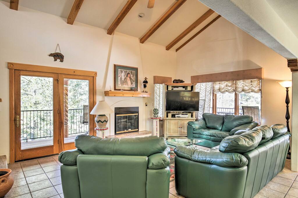 This 3-level townhome features towering ceilings with real wood beams.