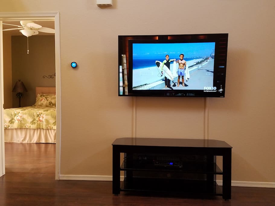 55" HDTV, master bedroom through the doorway